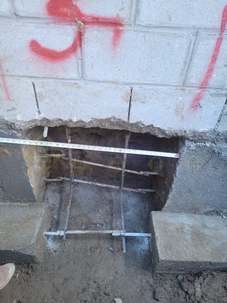 Underpinning basement in Toronto with steel rebars installed for concrete reinforcement and structural foundation support.